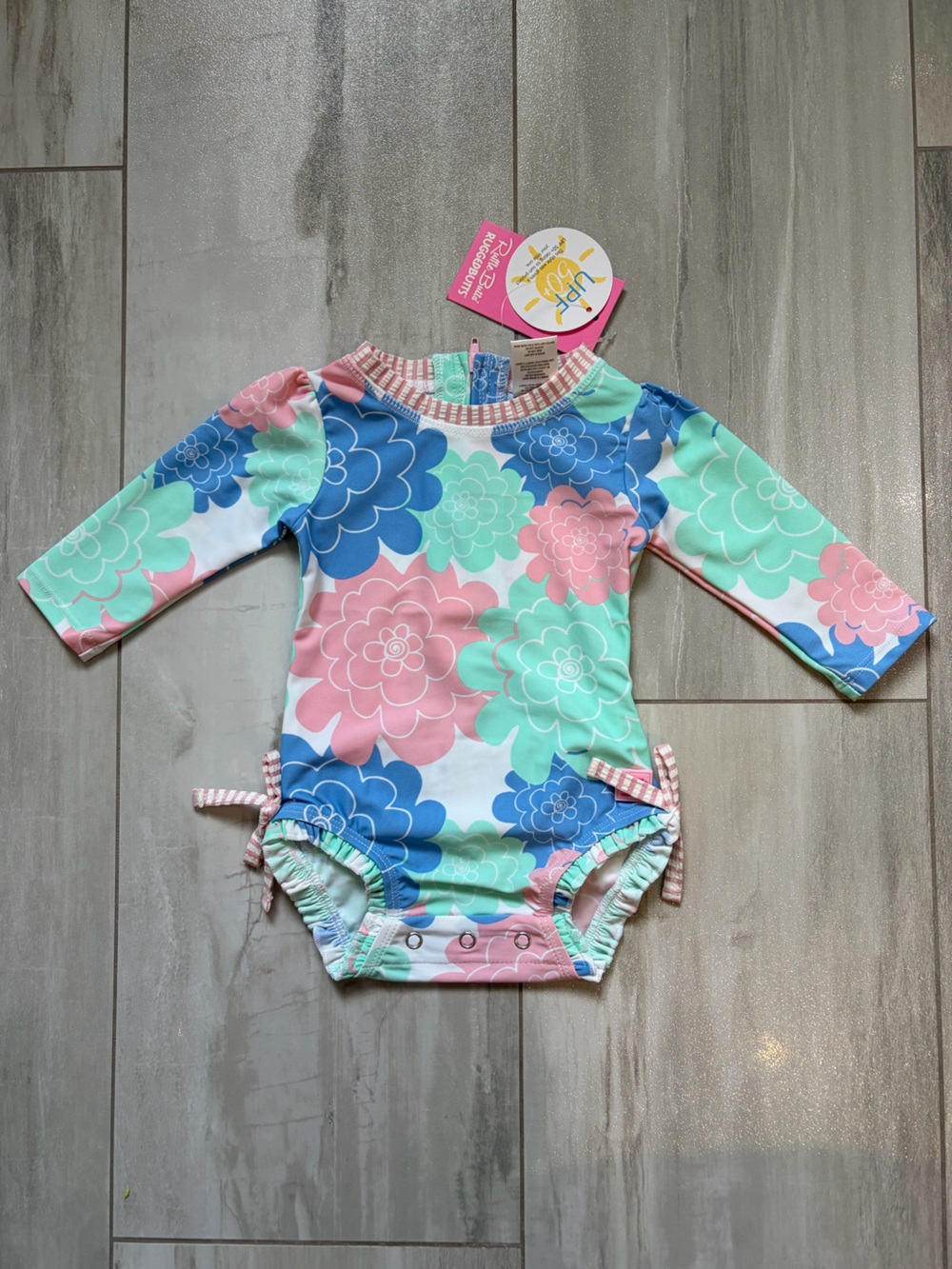 NWT RuffleButts Pastel Petals Long Sleeve RashGuard 1-piece Swimsuit Girls 3-6M
